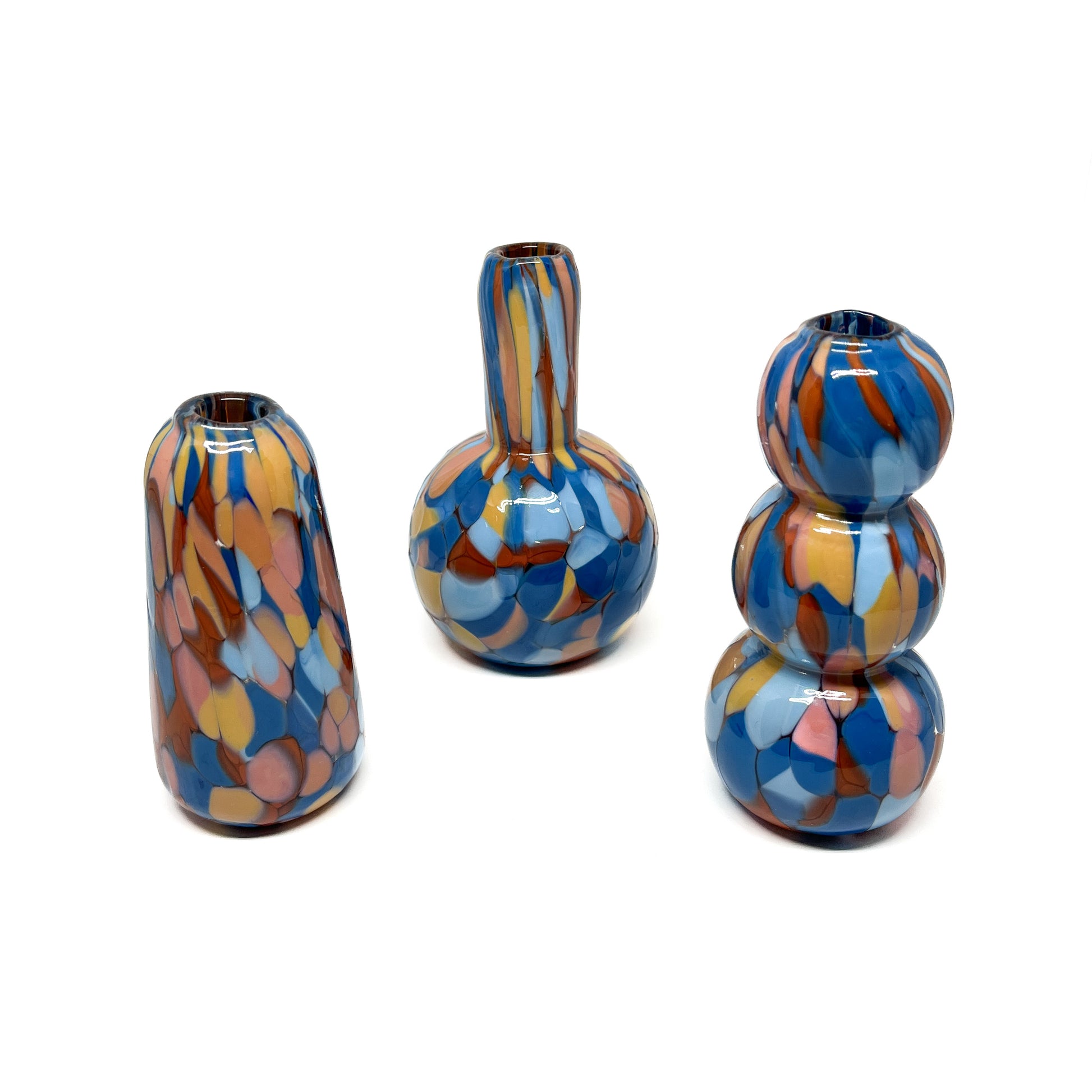 Alternate view of the three Blue & Orange Mini Vases displayed together in full view.
