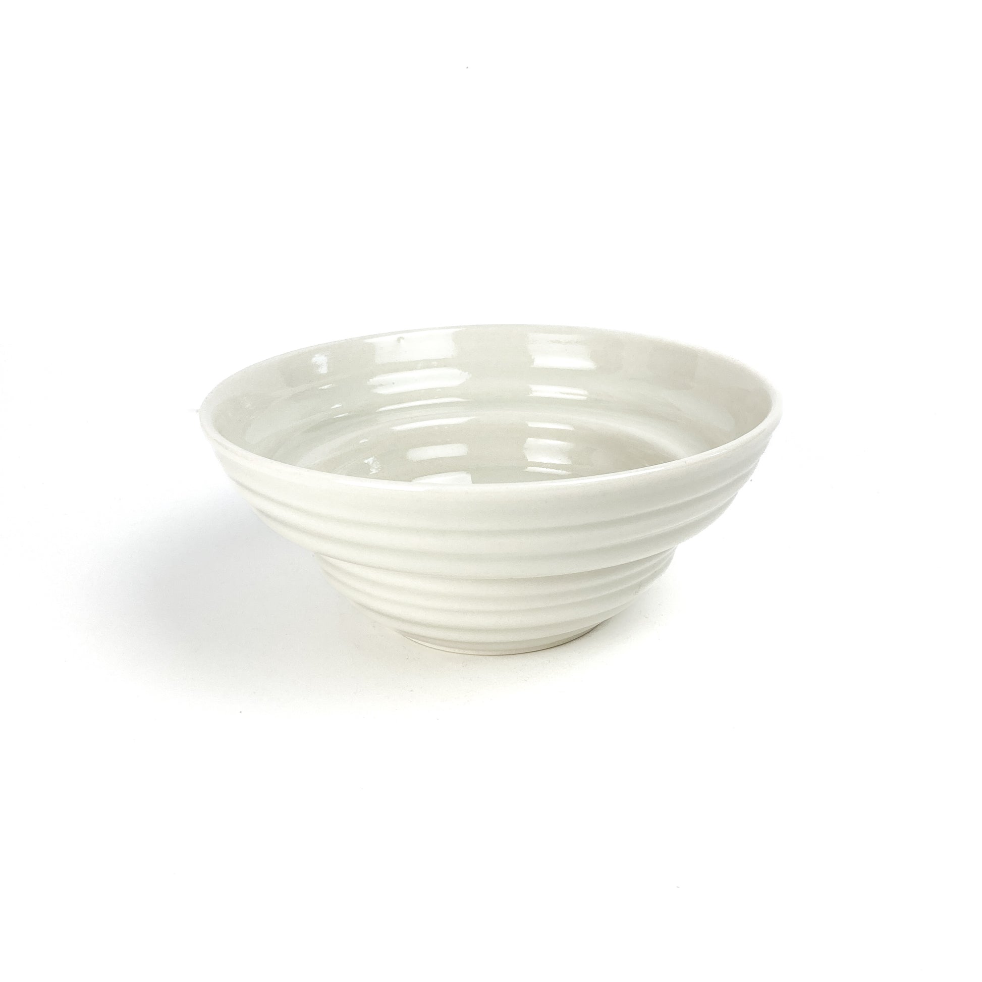 A round ceramic bowl, possibly a donburi bowl, with horizontal ridges stacked to form a conical shape and a smooth interior.