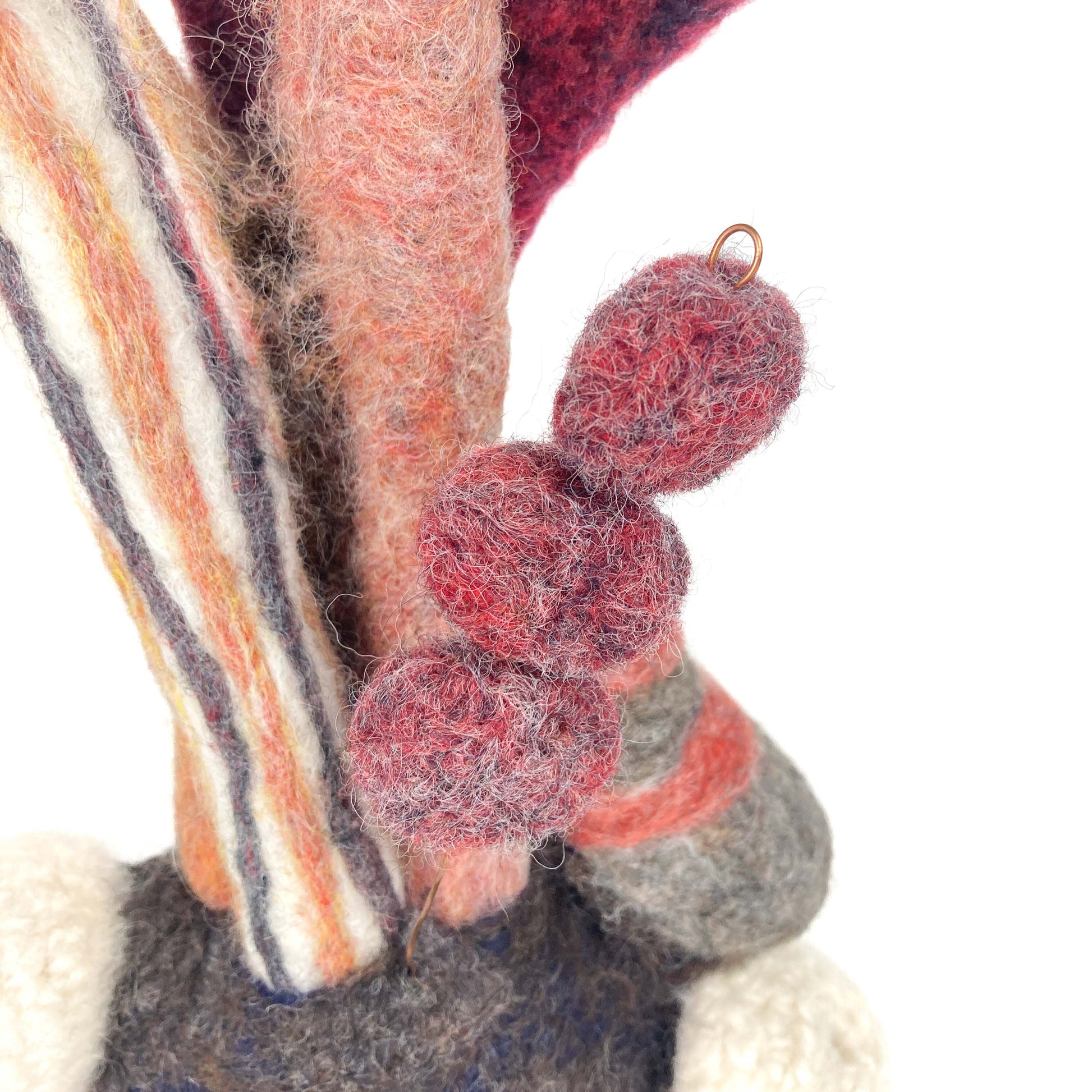 Detailed view of Christina Norberg's felted wool sculpture "Under the Sea Party," highlighting textural elements.