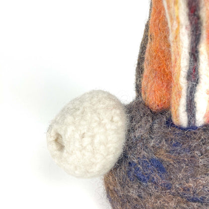 Close-up of the base of Christina Norberg's felted wool sculpture "Under the Sea Party," showing textured details.
