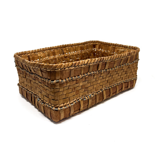 A rectangular woven basket with a brown and tan checkered pattern and a gray accent line.