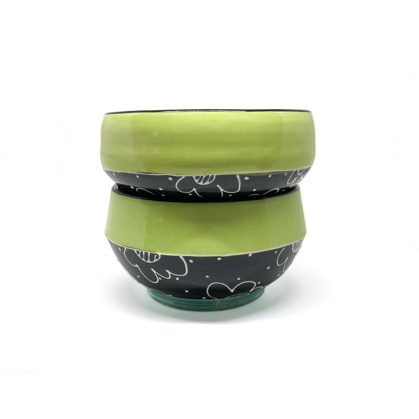 Bottom of the Soup Bowl featuring a signed base and a floral design wrapping around the exterior.