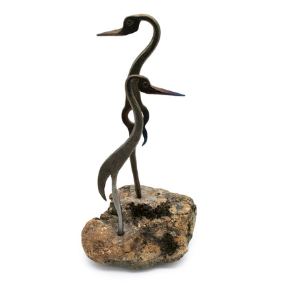 Cranes Sculpture on Rock