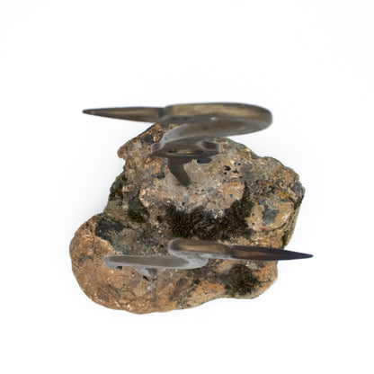 Cranes Sculpture on Rock