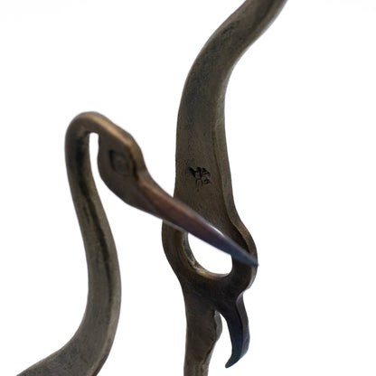 Cranes Sculpture on Rock