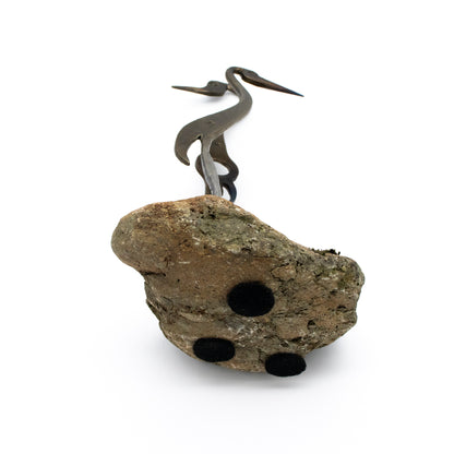 Cranes Sculpture on Rock