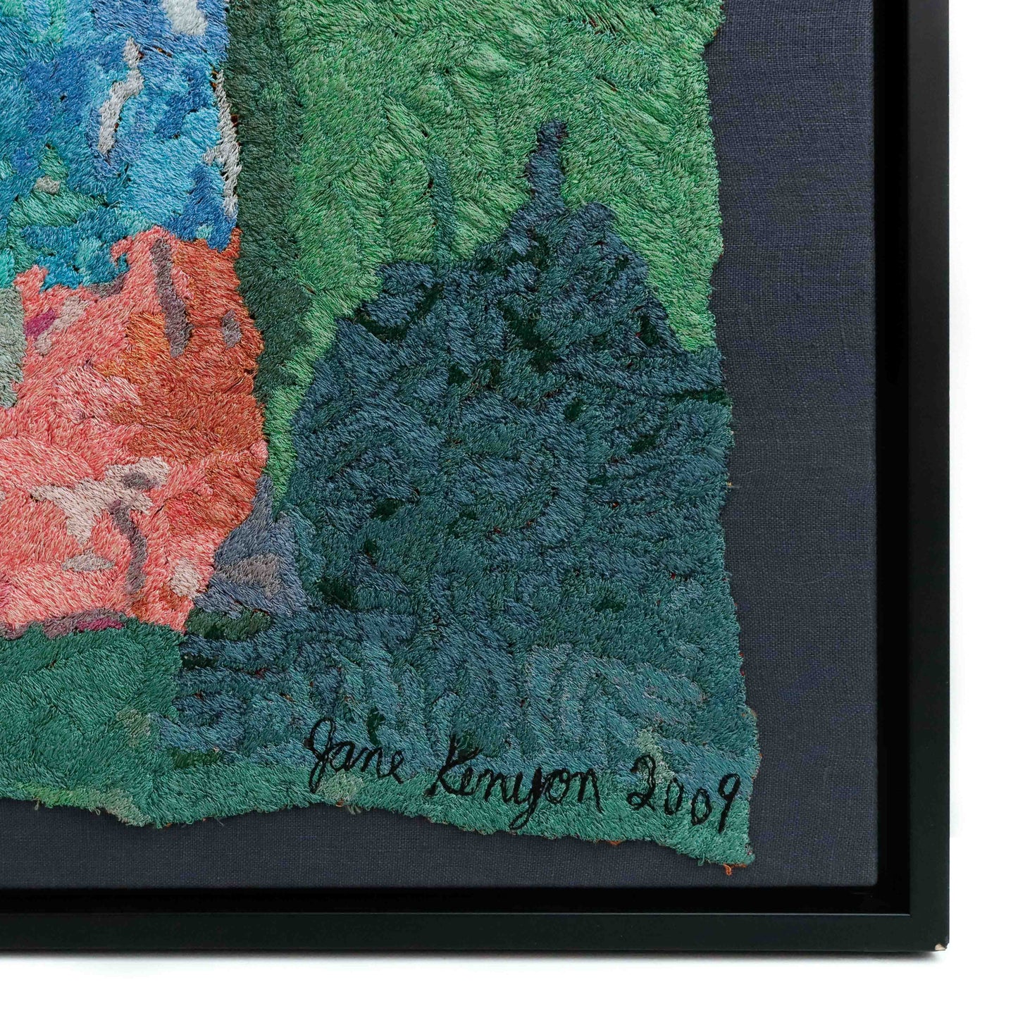 A close-up of a thread tapestry with a signature, showcasing intricate stitching and colorful thread. A beautiful painting by Jane Kenyon.