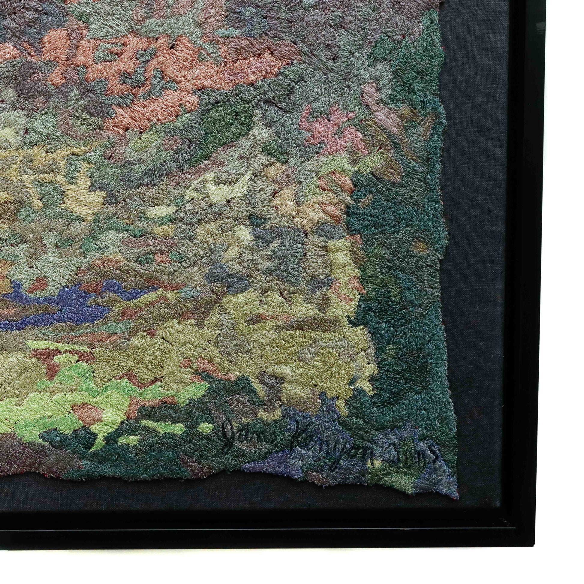 A close-up of a framed thread tapestry, showcasing intricate stitching and colorful thread. A beautiful thread painting by Jane Kenyon.