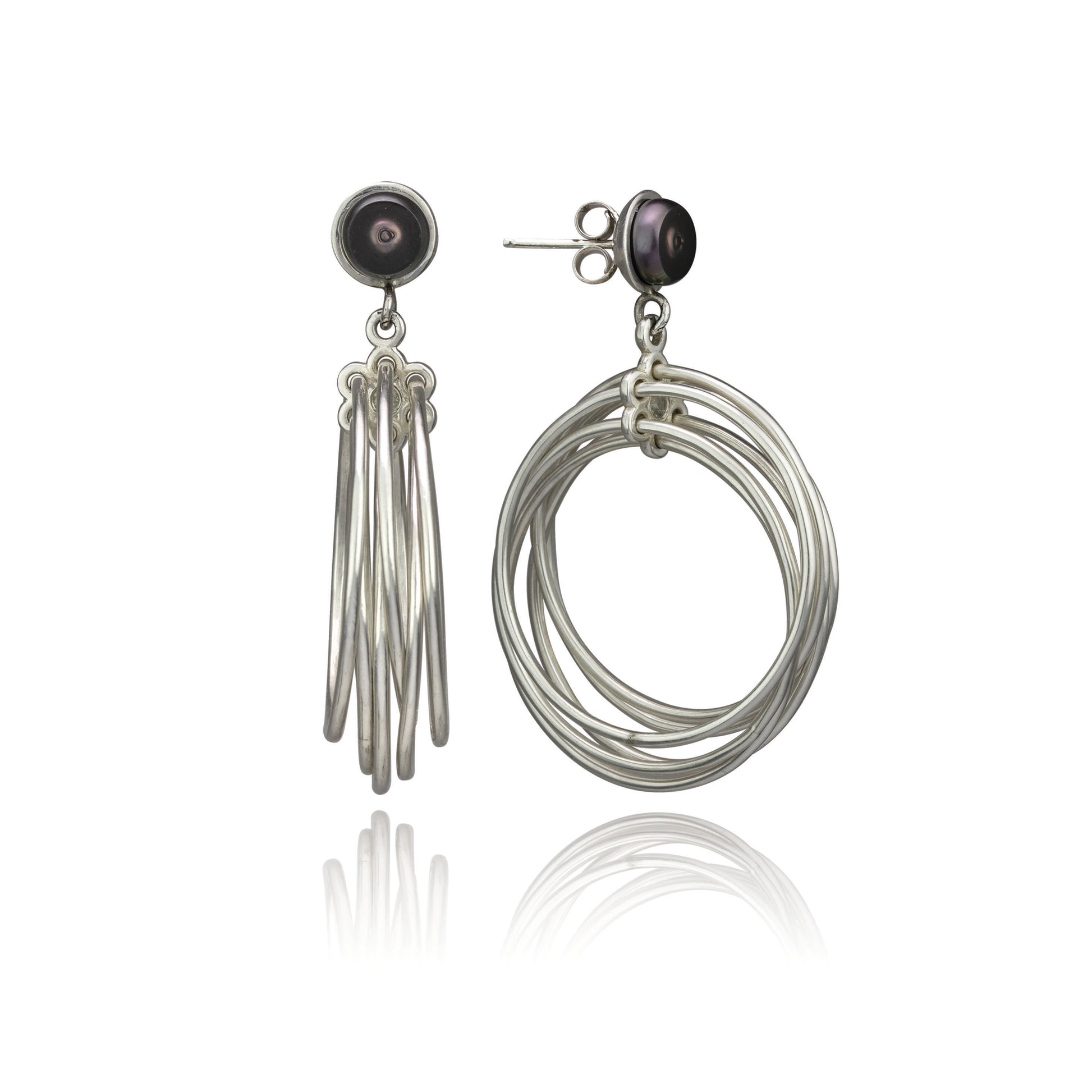 Two Edna Milevsky Spirograph Hoop Earrings, each with a dark pearl and cascading silver elements.