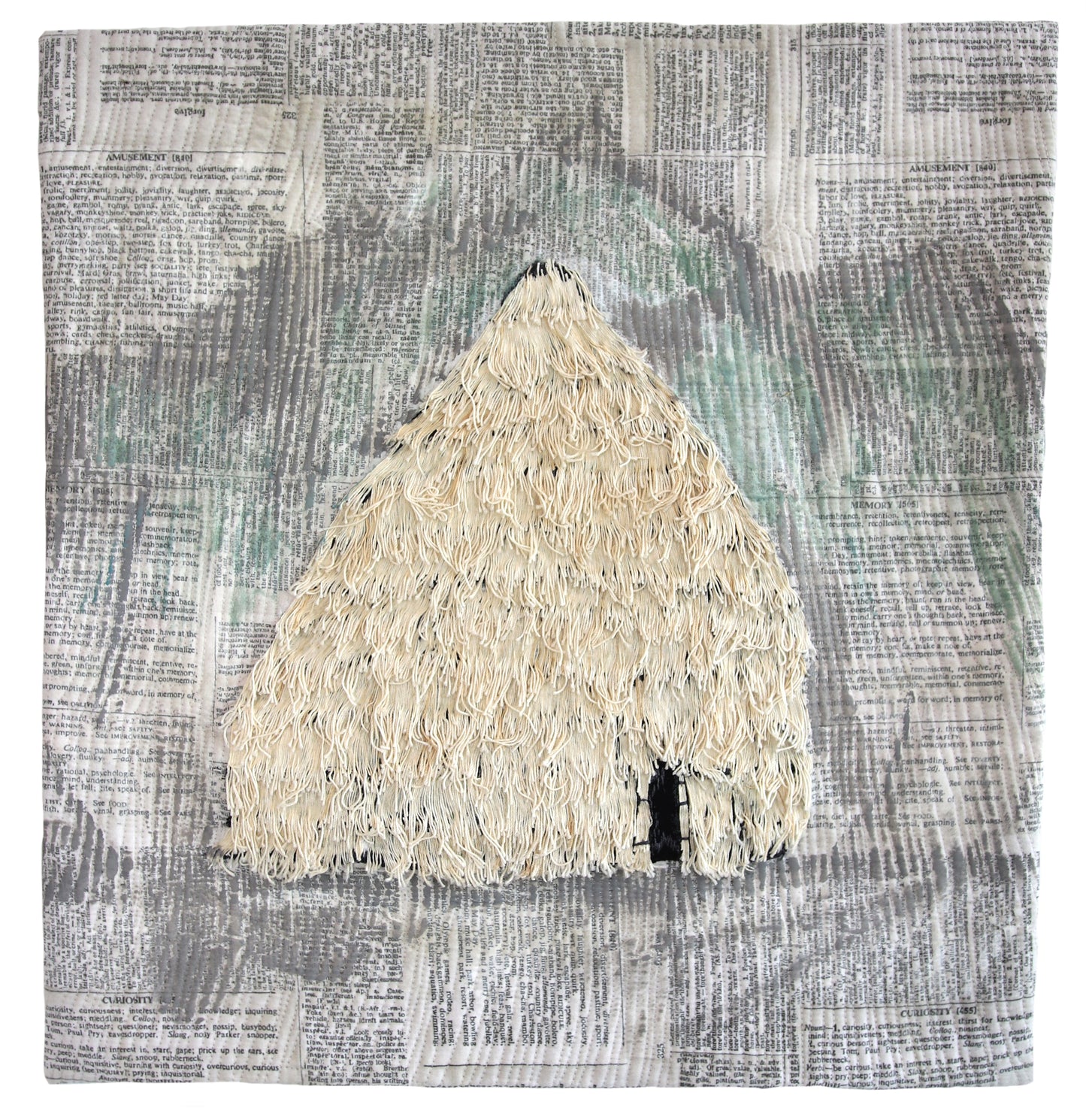 Textile art: a textured, light-colored conical structure with a dark opening, overlaid on a printed fabric.