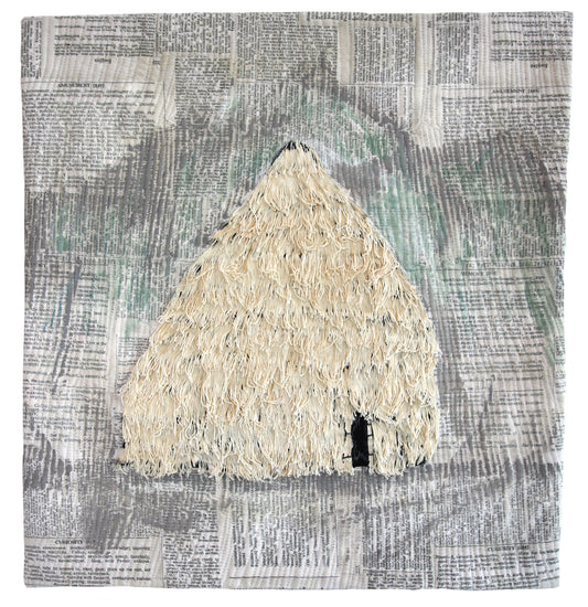 Textile art: a textured, light-colored conical structure with a dark opening, overlaid on a printed fabric.