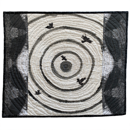 Textile art: "To the Center Wall Quilt" by Jennie Johnston, featuring swirling lines and five stitched birds.