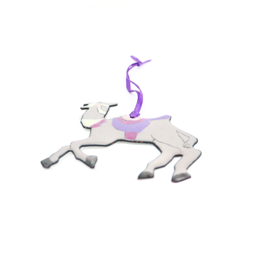 Camel Ornament with a purple saddle design, featuring a ribbon loop for hanging.