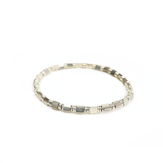 Angled view of Square Tube Bracelet showcasing silver square tube beads separated by wire coil spacers.