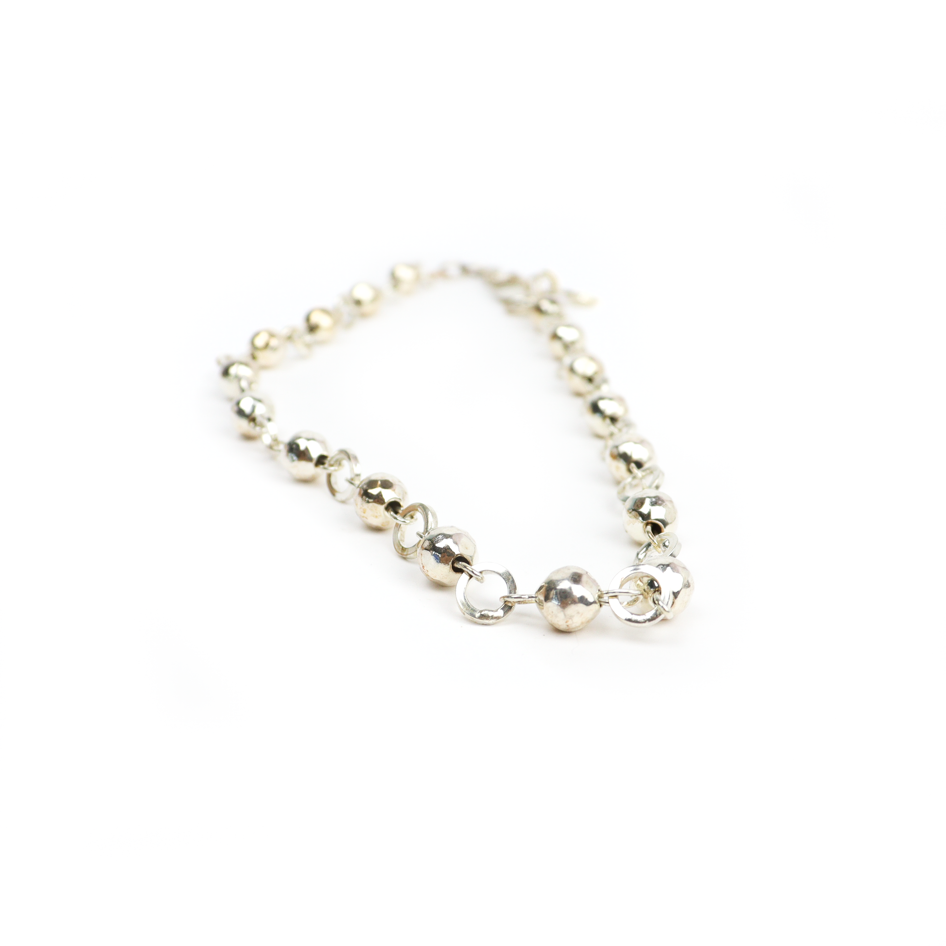 Close-up of Ball & Chain Necklace with shiny silver balls and linked chain design.