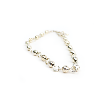 Close-up of Ball & Chain Necklace with shiny silver balls and linked chain design.
