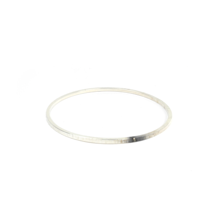 A thin, circular, metallic bangle.