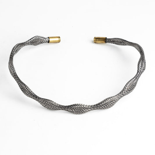Curved stainless steel braided necklace with gold end caps.