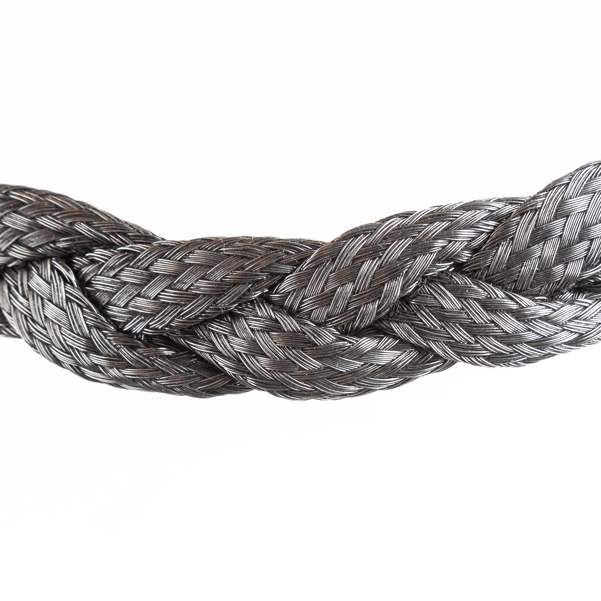 Close-up of a braided stainless steel necklace section on a white background.