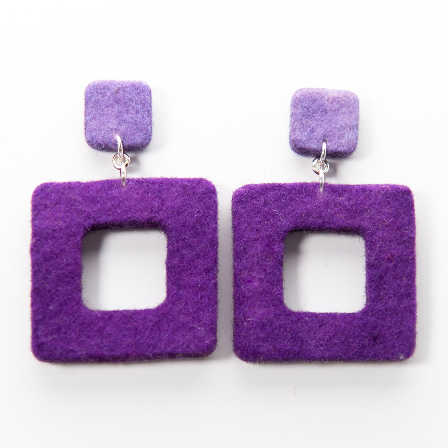 Two purple felt square drop earrings with lighter purple square studs.